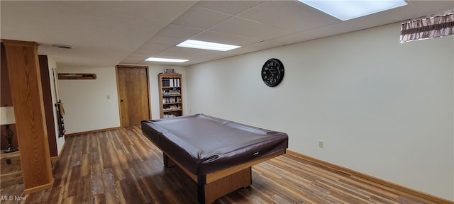 playroom with pool table, wood-type flooring, and a paneled ceiling