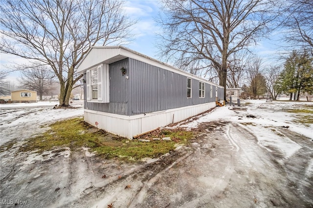 view of snow covered property