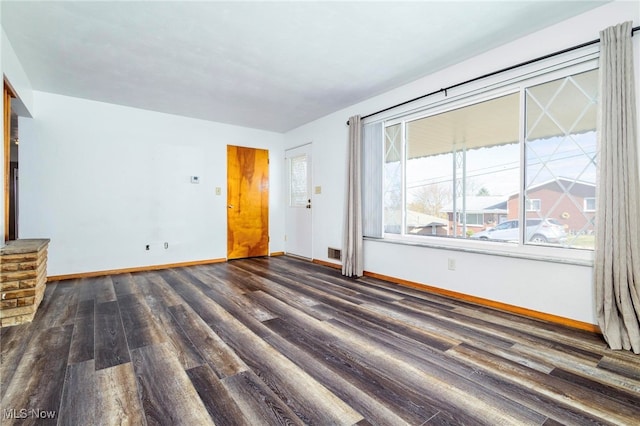 interior space with dark wood-type flooring