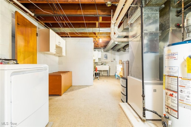 basement with water heater and separate washer and dryer