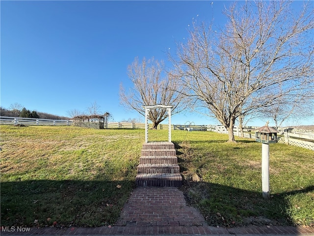 surrounding community featuring a yard