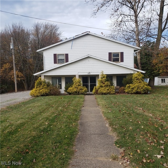 view of front property with a front lawn