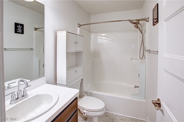 full bathroom with vanity, shower / tub combination, and toilet