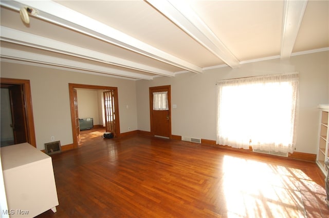 unfurnished room featuring crown molding, dark hardwood / wood-style flooring, and beamed ceiling