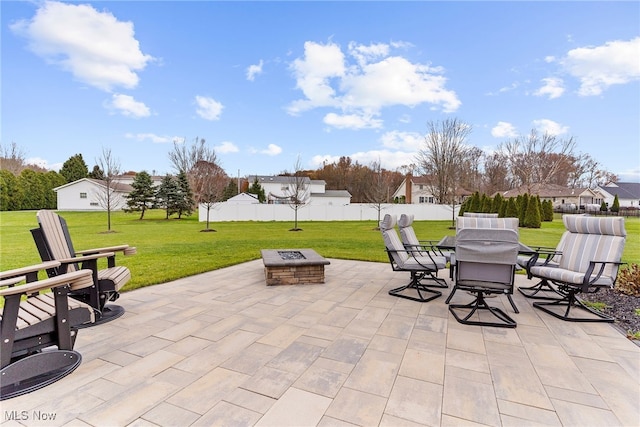 view of patio featuring an outdoor fire pit