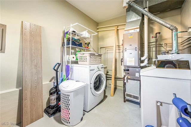 laundry area featuring washing machine and dryer