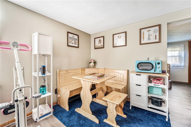 dining space featuring hardwood / wood-style floors