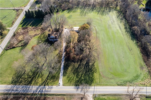 birds eye view of property featuring a rural view