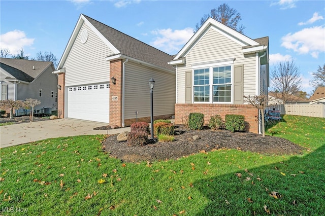 view of front of property featuring cooling unit, a front lawn, and a garage