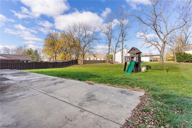 view of yard with a playground