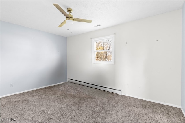 carpeted spare room featuring ceiling fan and a baseboard heating unit