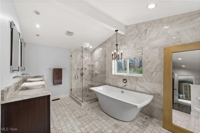 bathroom with an inviting chandelier, separate shower and tub, lofted ceiling with beams, tile walls, and vanity