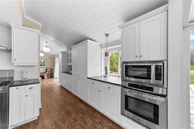 kitchen featuring decorative light fixtures, white cabinetry, wood ceiling, stainless steel appliances, and dark wood-type flooring