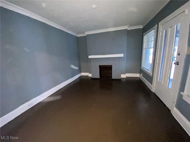 unfurnished living room featuring crown molding and a fireplace