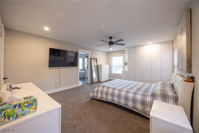 carpeted bedroom featuring ceiling fan