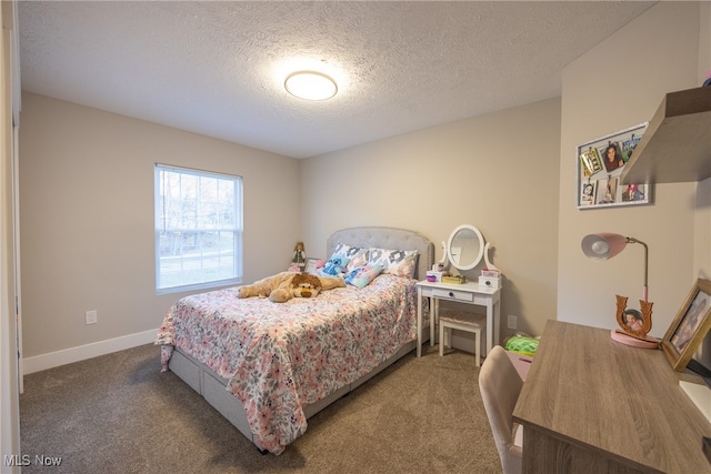 carpeted bedroom with a textured ceiling