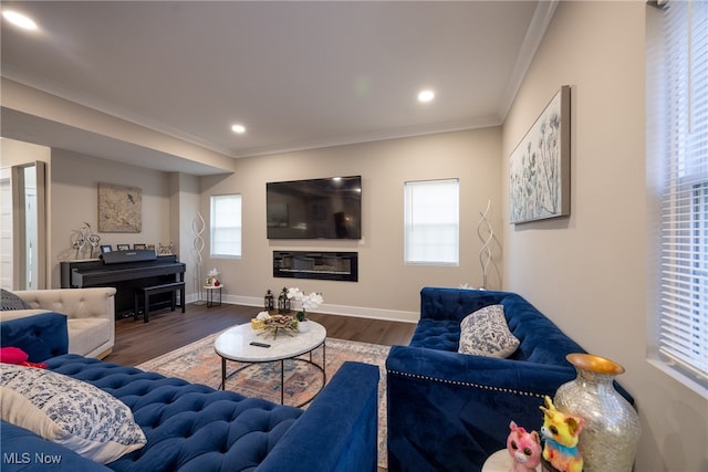 living room with ornamental molding and dark wood-type flooring