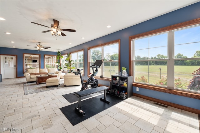 exercise area with ceiling fan