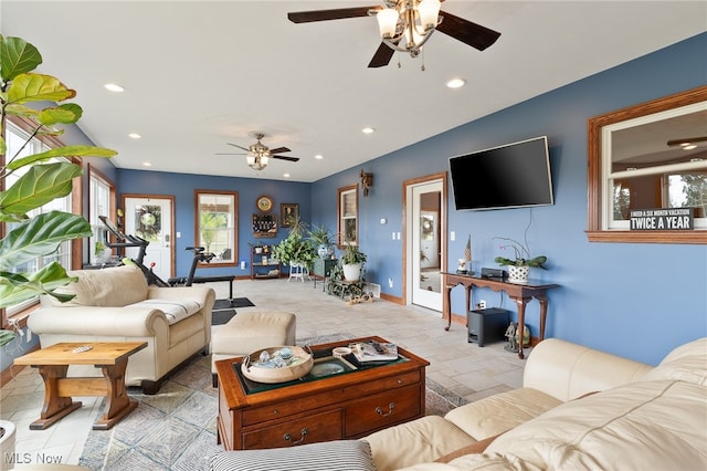 living room featuring ceiling fan