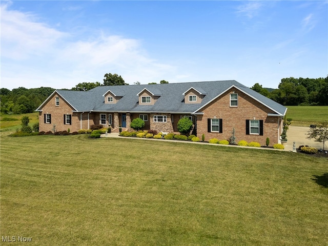 view of front of home with a front yard