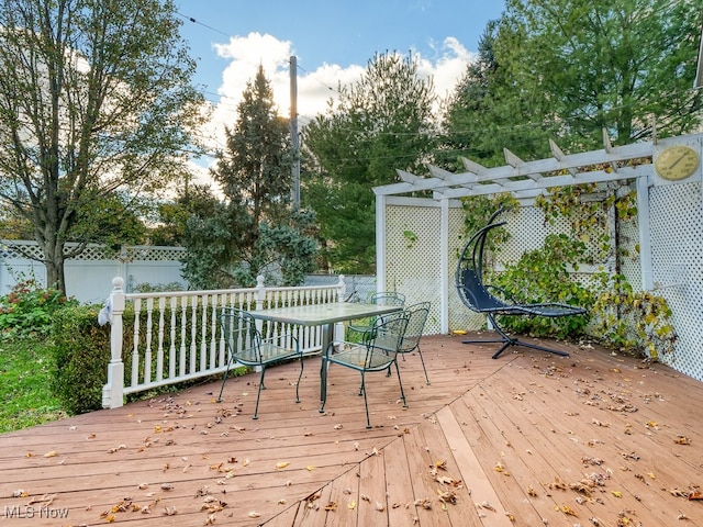 wooden terrace with a pergola