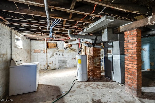 basement featuring washer / clothes dryer, water heater, and heating unit