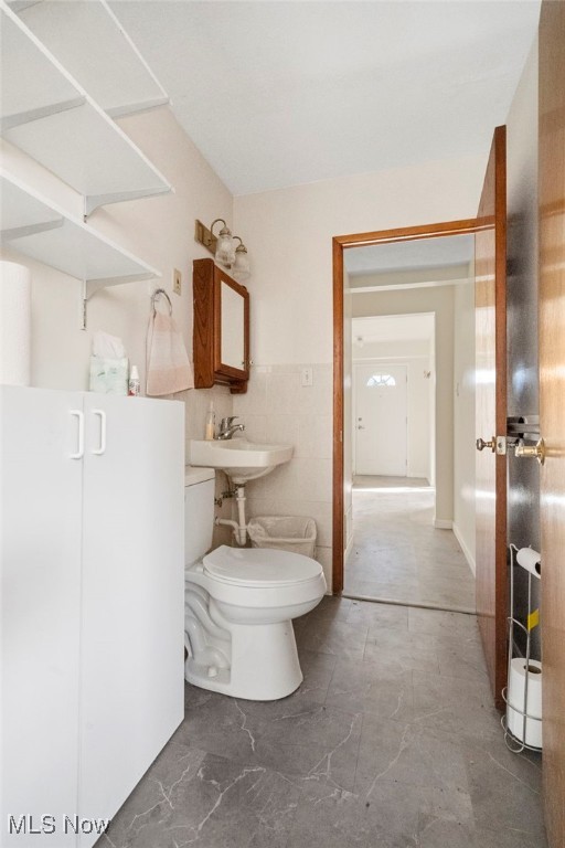 bathroom featuring toilet