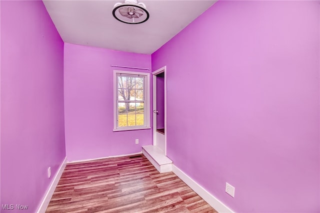 spare room featuring light hardwood / wood-style flooring