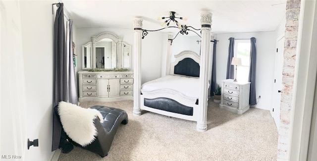 bedroom with light colored carpet