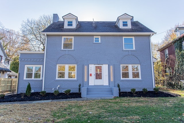 view of front facade with a front lawn