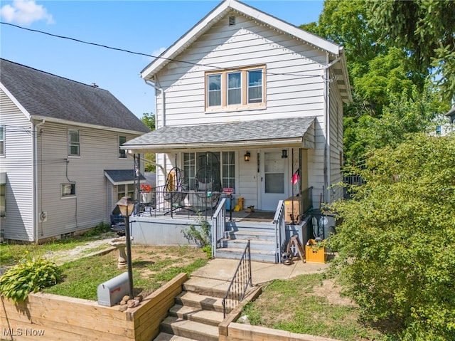 view of front of home featuring covered porch