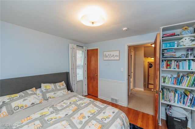 bedroom featuring hardwood / wood-style flooring