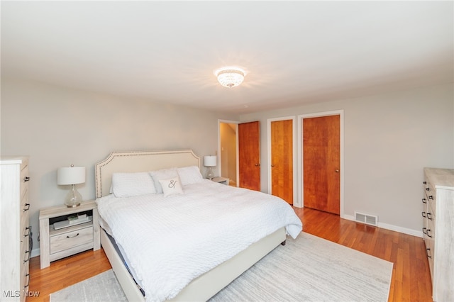 bedroom featuring light hardwood / wood-style floors