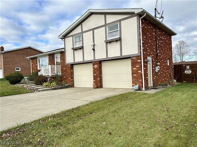 view of front of house featuring a front yard and a garage