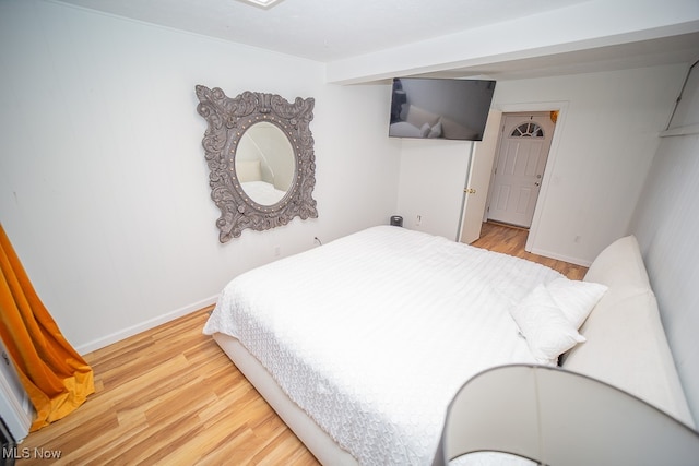 bedroom featuring light wood-type flooring