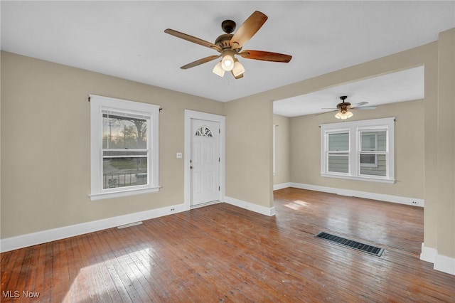 entryway featuring hardwood / wood-style flooring and ceiling fan