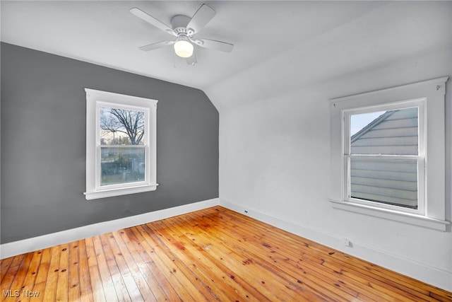 bonus room featuring ceiling fan, hardwood / wood-style floors, and lofted ceiling