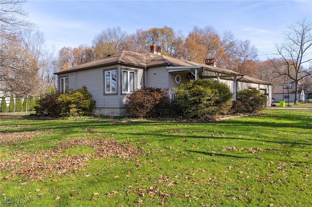 view of home's exterior featuring a lawn