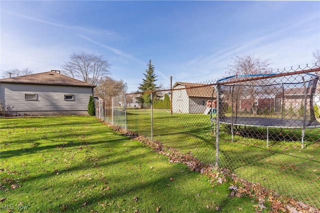 view of yard featuring a trampoline