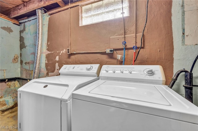 washroom featuring washing machine and dryer