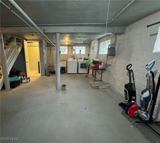 basement with washing machine and dryer