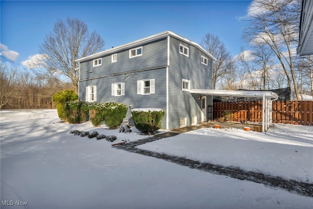 view of snow covered property