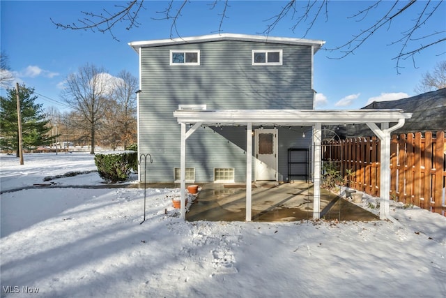 view of snow covered property