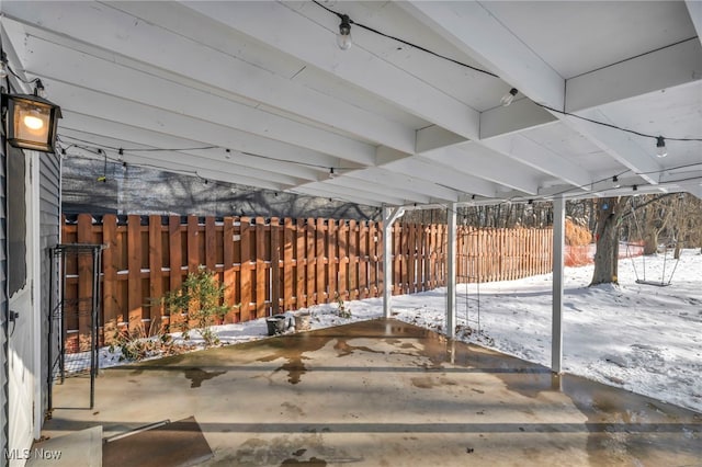 view of snow covered patio