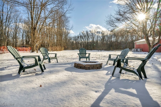 view of community featuring a fire pit