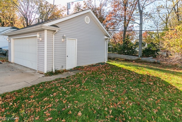 garage with a lawn