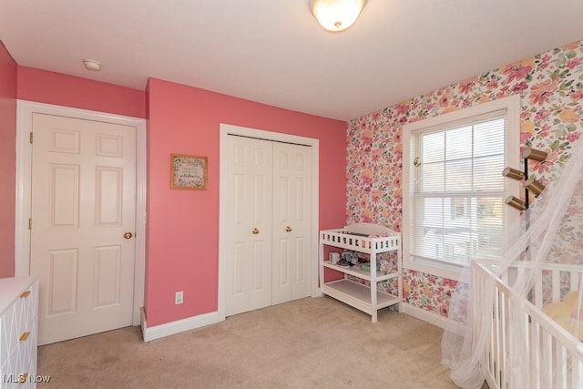 carpeted bedroom featuring a closet