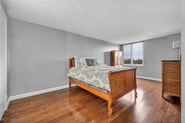 bedroom featuring hardwood / wood-style floors