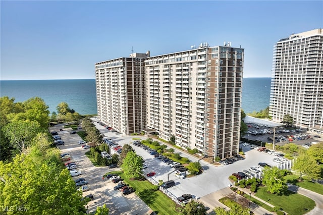 view of building exterior with a water view