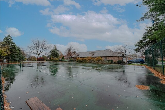 view of water feature with fence